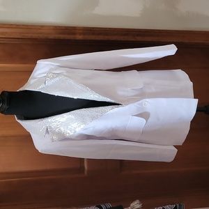 White silky jacket with sequin lapel and around neck.